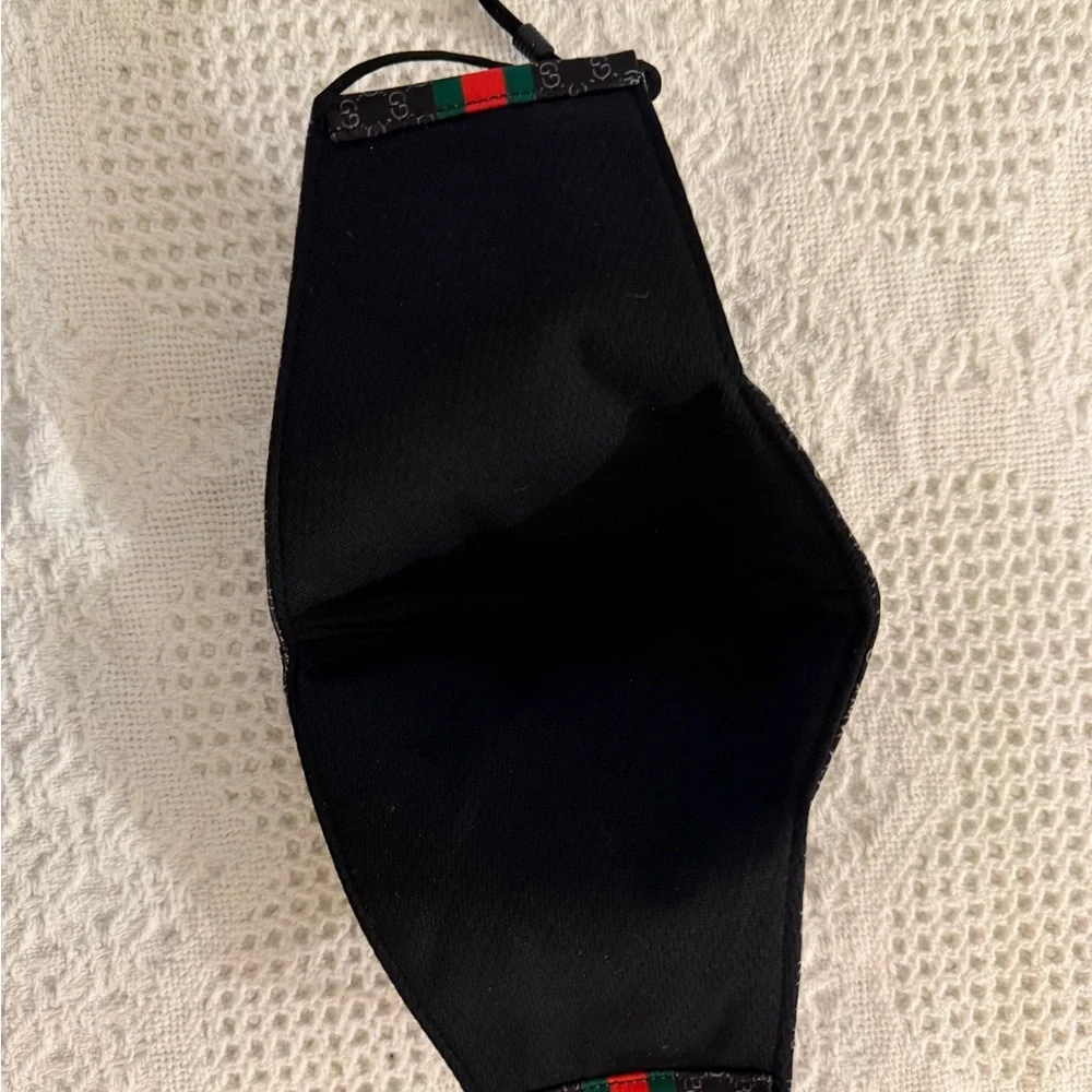 Designer-Inspired Black Face Mask with Yellow Accent and Green-Red Stripe